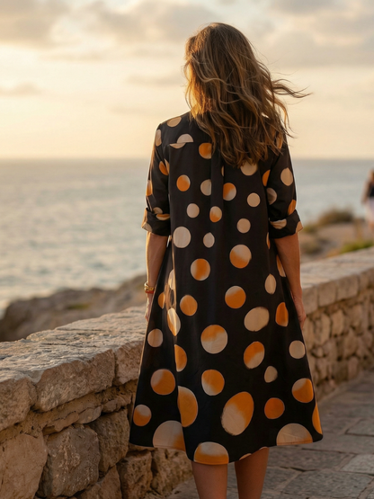 Verónica | Abito a pois al tramonto