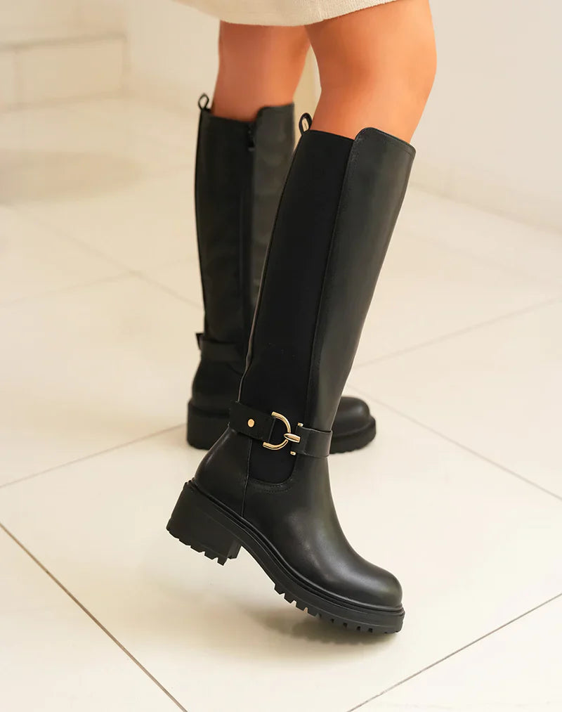 Botas altas negras con banda elástica y detalle dorado