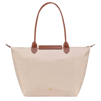 Bolso Grande Premium, Papel